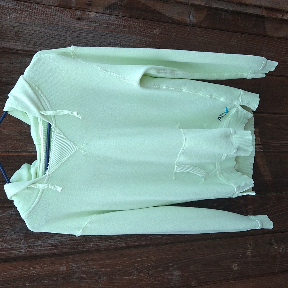 Neon green hoodie.